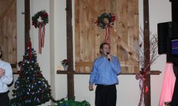 Singing some Frank Sinatra for his co-workers at a corporate function. Great addition for any event.