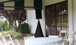 This is our Cocktail hour set up. Nice and elegant looking with a speaker on a stand with the computer hidden under the black skirt.