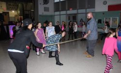 Girls Scouts Father-Daughter Dance. Girls getting low with the limbo!