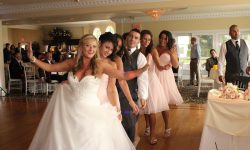 The bride is ready to lead a conga line.