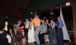 The Bride and guests ready to break it down on the stage with me.