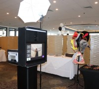 Our open-air photobooth for a Junior/Senior Prom. The system is black, small and High Tech which includes an 18 megapixel Canon T7i camera for great photo quality.