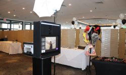 Our open-air photobooth for a Junior/Senior Prom. The system is black, small and High Tech which includes an 18 megapixel Canon T7i camera for great photo quality.