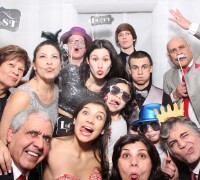 This family photo from a Sweet 16 was taken by the photobooth inside our enclosed booth. Here's 13 guests in the booth.