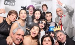 This family photo from a Sweet 16 was taken by the photobooth inside our enclosed booth. Here's 13 guests in the booth.