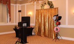 Our ope- air photobooth with Gold Sequined backdrop. We have various choices for backdrops. Fun props are always included!!